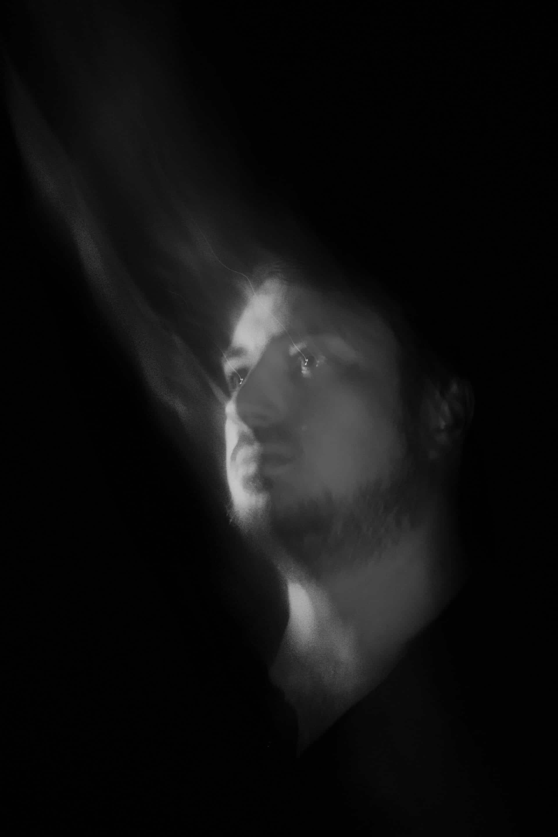 Black and white portrait of photographer and cinematographer Ruben Teshmar